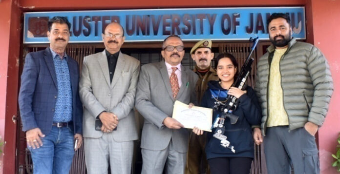 Aneesha posing along with Cluster University management.