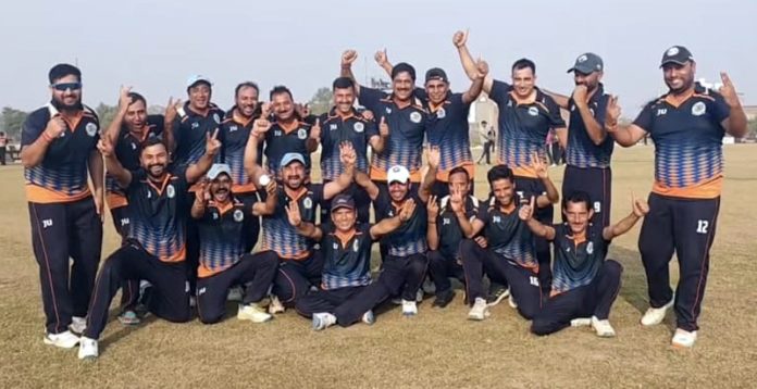 Winning team posing for group photograph.