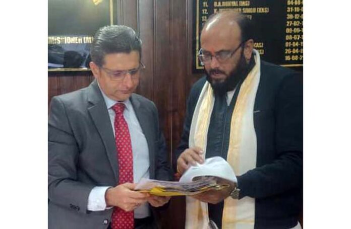 BJP KDD president Rajeev Pandita presenting a memorandum to Relief Commissioner Dr Arvind Karwani.