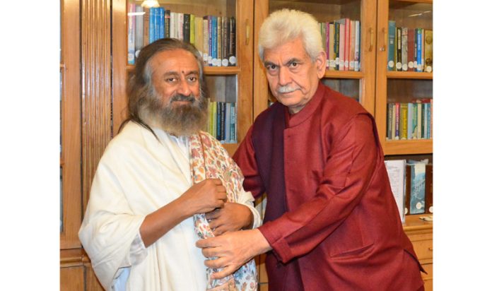 Sri Sri Ravi Shankar meeting LG at Raj Bhawan Srinagar on Tuesday.