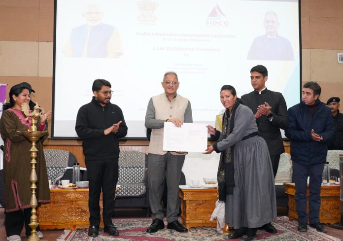 Ladakh LG Kavinder Gupta distributing loan sanction letters to beneficiaries during an event in Leh on Friday. Ladakh LG Kavinder Gupta distributing loan sanction letters to beneficiaries during an event in Leh on Friday.