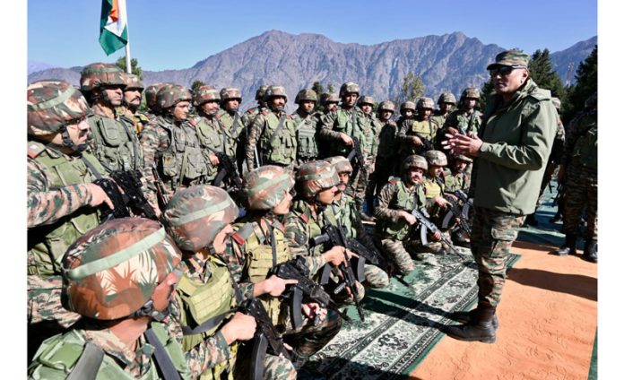 Lt Gen Pratik Sharma interacting with troops in North Kashmir on Tuesday.