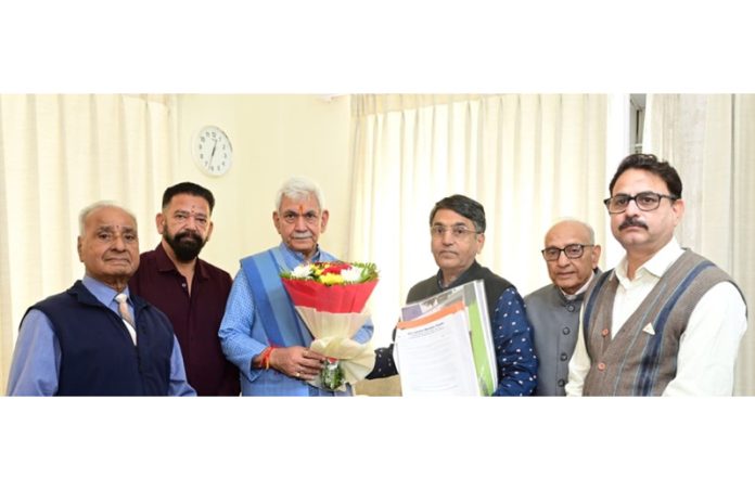 A delegation of Lakshmi Narayan Temple Management Trust meeting Lieutenant Governor Manoj Sinha on Wednesday.