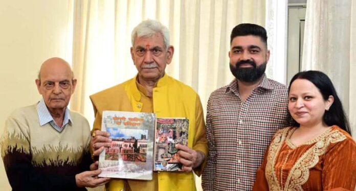 LG Manoj Sinha being presented with book in Dogri.