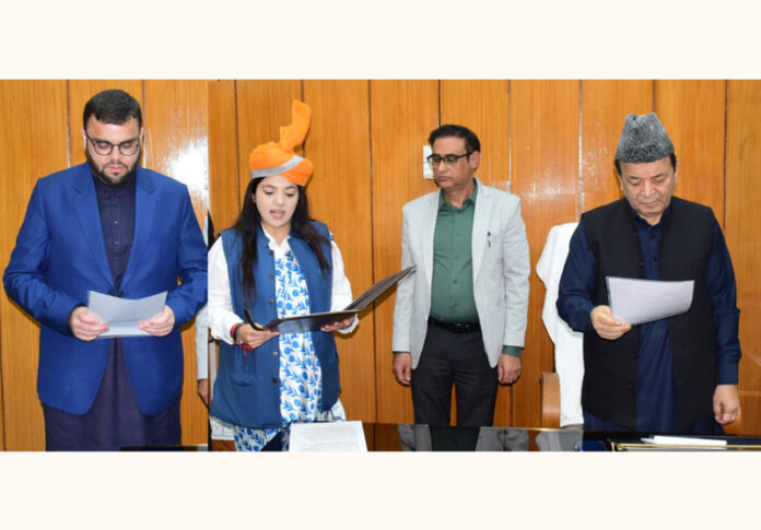 Speaker administering oath to newly elected MLAs on Friday.