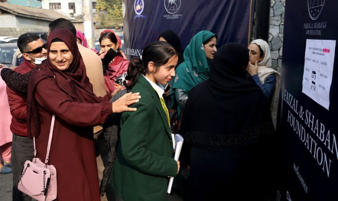Students outside an educational institution in Srinagar before participating in Class 10th exam. -Excelsior/Shakeel Students outside an educational institution in Srinagar before participating in Class 10th exam. -Excelsior/Shakeel