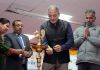 LG Kavinder Gupta lighting the traditional lamp during a function in Leh.