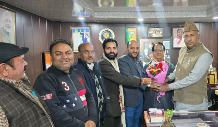 A delegation of people from Kashmir Valley presenting a bouquet to MP (RS) and senior BJP leader, Gulam Ali Khatana during their meeting with him at Srinagar on Tuesday.