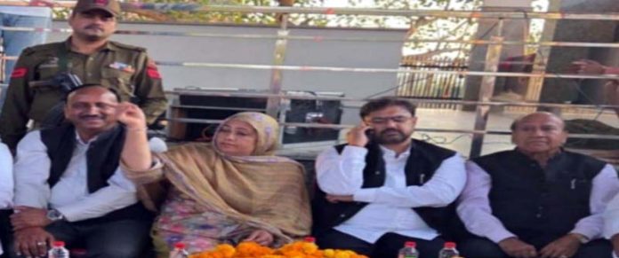 Minister Satish Sharma flanked by senior NC leaders campaigning for Shamim Begum in Mathwar area.