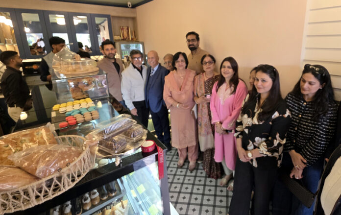 Vinod Sachdeva along with others inaugurating a café in Jammu. -Excelsior/Rakesh