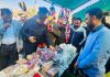 Minister Javed Rana inspecting a stall at an exhibition on Saturday.
