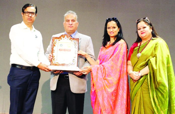 Director Colleges being presented a memento during inaugural of Display Your Talent-Tawi zone at GCW Parade Jammu on Thursday. Director Colleges being presented a memento during inaugural of Display Your Talent-Tawi zone at GCW Parade Jammu on Thursday.
