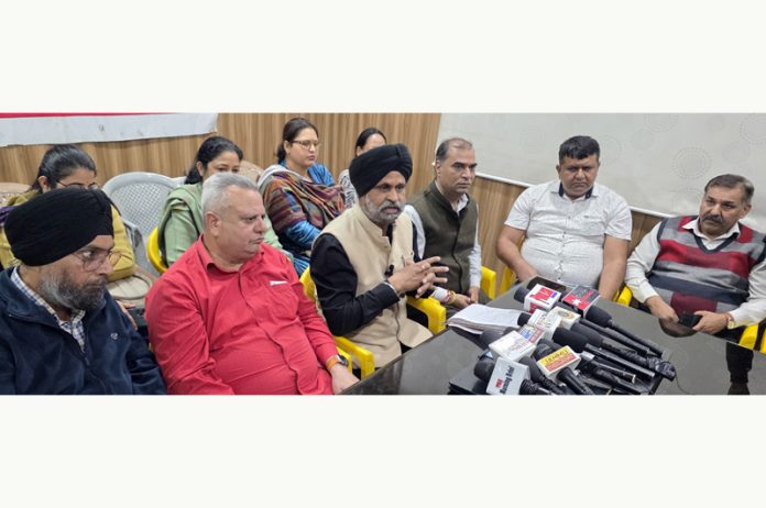 JKMEF president Jaswinder Singh and others during a press conference at Jammu. — Excelsior/Rakesh