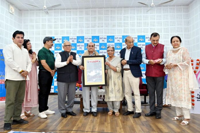 Inderjeet Kesar receiving Shri Bandhu Sharma Smriti Puraskar -2025, during the function organized by Dogri Sanstha Jammu. Inderjeet Kesar receiving Shri Bandhu Sharma Smriti Puraskar -2025, during the function organized by Dogri Sanstha Jammu.