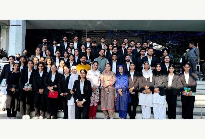 Students of The Law School, University of Jammu and others posing for a photograph after an educational and immersive court visit on Friday.