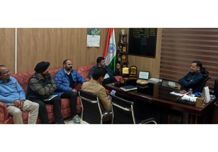 DHSJ Dr Abdul Hamid Zargar chairing a review meeting at CMO office Udhampur.