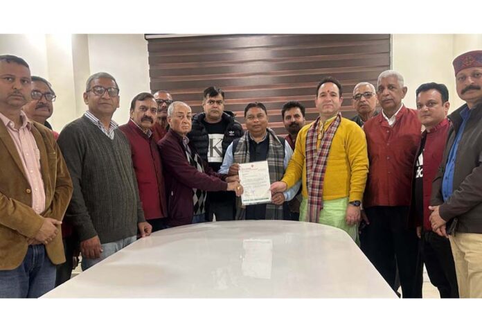 President, Maa Shakti, R K Bhan handing over a draft to BJP president, Sat Sharma and LoP, Sunil Sharma for Prime Minister's Relief Fund at Jammu on Friday.