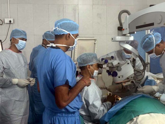Army doctors performing an eye surgery on a civilian at Command Hospital, Northern Command, Udhampur.