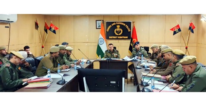 SSP Naresh Singh chairing a meeting in Kishtwar on Tuesday. -Excelsior/Tilak Raj