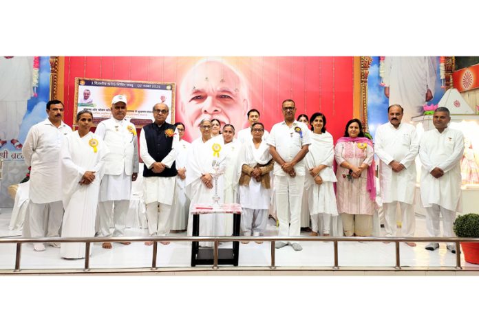 Dr SP Verma posing along with others during a function organized by BKs in Jammu.