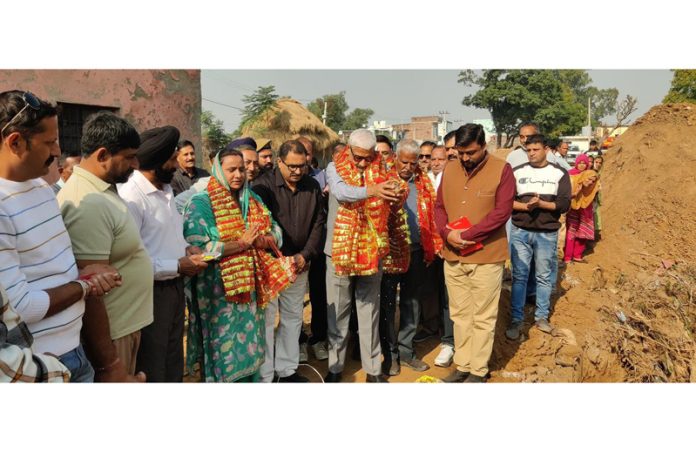MLA Sham Lal Sharma laying foundation stone of Overhead Water Tank at Panchayat Kot Lower Ghari (B) in Jammu North Constituency.