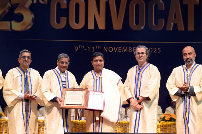 Acharya Balkrishan of Patanjali Yogpeeth receiving the degree of Ph.D from the University of Petroleum and Energy Studies on Monday .