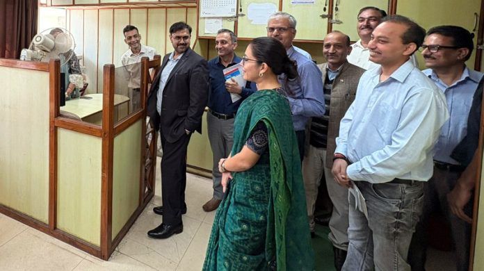 Minister Satish Sharma inspecting offices on opening day of Darbar Move on Monday.