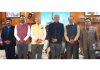 LG Kavinder Gupta posing along with others during a meeting in Ladakh.