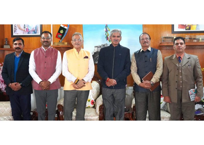 LG Kavinder Gupta posing along with others during a meeting in Ladakh.