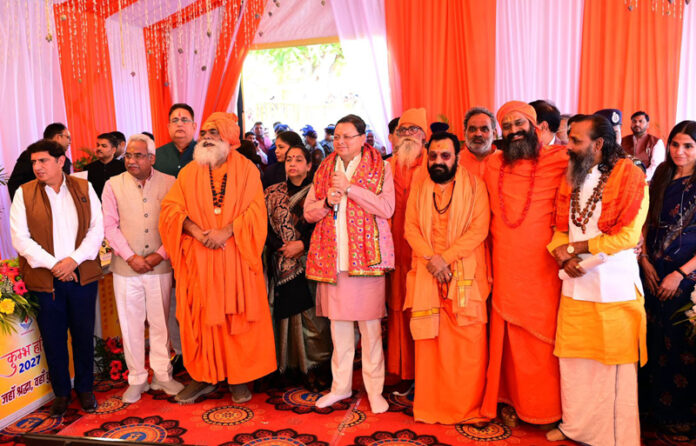 Uttarakhand CM Pushkar Singh Dhami meeting with Acharyas and saints to review preparations for Haridwar Kumbh Mela 2027.