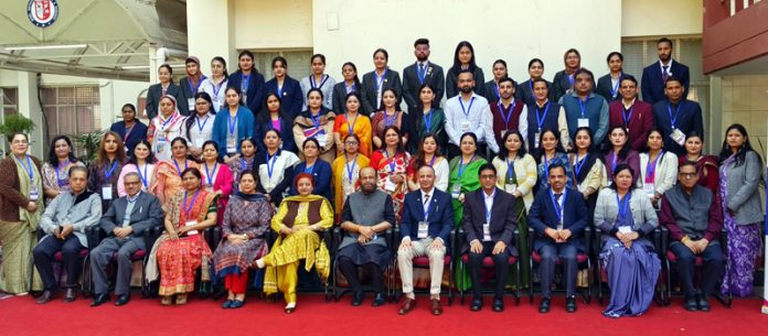 Participants of two-day seminar at MIER posing for a group photograph.