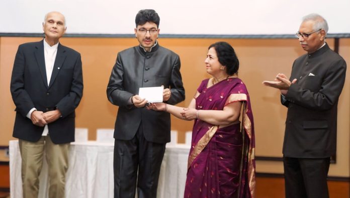 Dignitaries conferring award to members of Kashmiri Pandit community at a function at Brampton Canada. Dignitaries conferring award to members of Kashmiri Pandit community at a function at Brampton Canada.