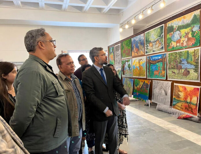 Dignitaries watching the exhibition. Dignitaries watching the exhibition.