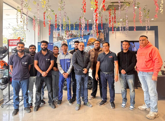 Dignitaries during an event at AM Bajaj showroom B.C Road, Rehari Chungi Jammu on Thursday. Dignitaries during an event at AM Bajaj showroom B.C Road, Rehari Chungi Jammu on Thursday.