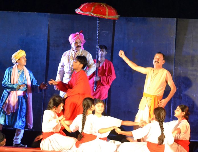 A scene from Dogri play ‘Bawa Jitto’ staged at Jhiri Mela in Jammu.