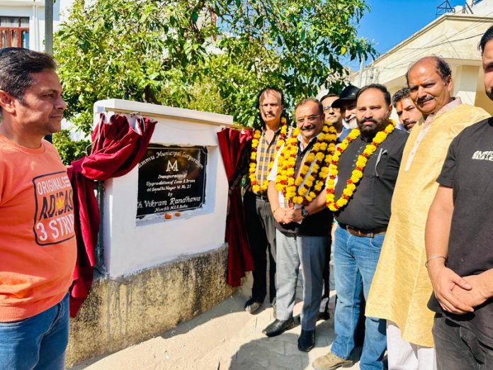 MLA Bahu Ch. Vikram Randhawa inaugurating lane and drain work at Gandhi Nagar. MLA Bahu Ch. Vikram Randhawa inaugurating lane and drain work at Gandhi Nagar.