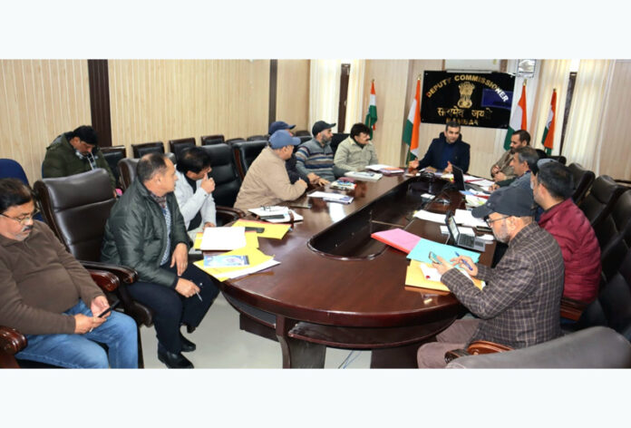 DC Mohammad Alyas Khan chairing a meeting to review the assessment of funds under the State Disaster Response Fund (SDRF) in Ramban.