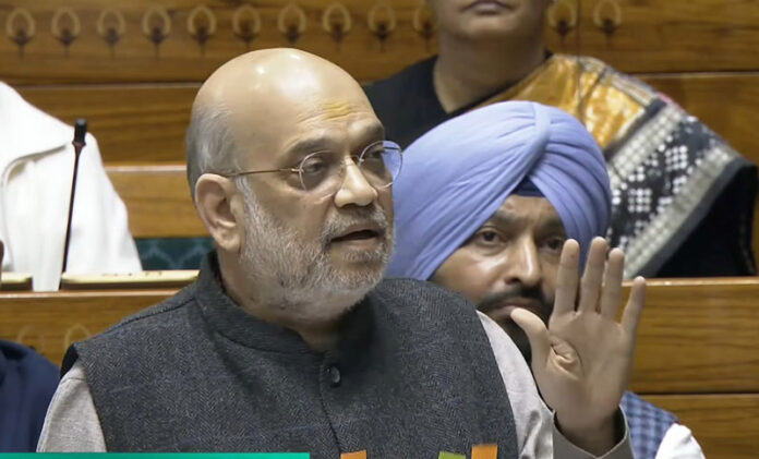 Union Home Minister Amit Shah speaks in Lok Sabha on Wednesday. (UNI) Union Home Minister Amit Shah speaks in Lok Sabha on Wednesday. (UNI)