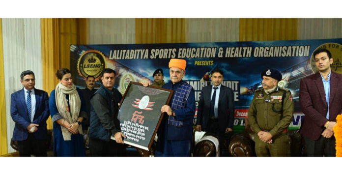 LG Manoj Sinha receiving memento during inauguration of KPPL at Jammu on Monday.