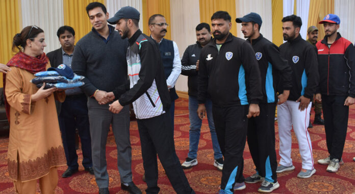 DC Jammu Dr Rakesh Minhas and Secretary JKSC Nuzhat Gul distributing kits to Softball players. DC Jammu Dr Rakesh Minhas and Secretary JKSC Nuzhat Gul distributing kits to Softball players.