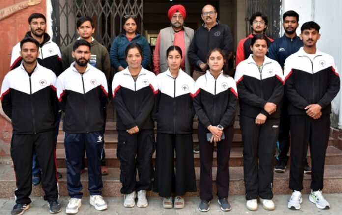 Archers posing along with dignitaries. Archers posing along with dignitaries.