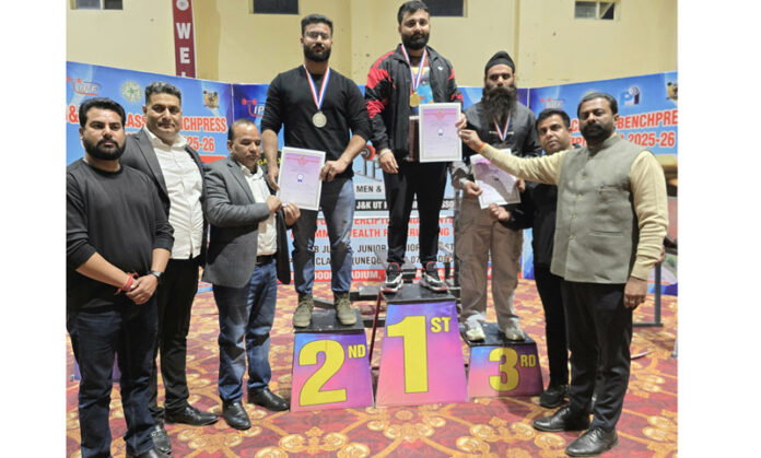 Winners on podium posing along with dignitaries. Winners on podium posing along with dignitaries.
