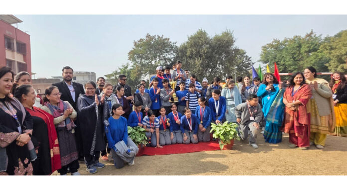 Students posing along with dignitaries during a programme. Students posing along with dignitaries during a programme.