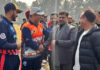 Sports Minister Satish Sharma interacting with players during inaugural event at Jammu University.
