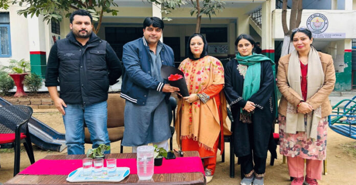 School Management presenting bouquet to dignitary.