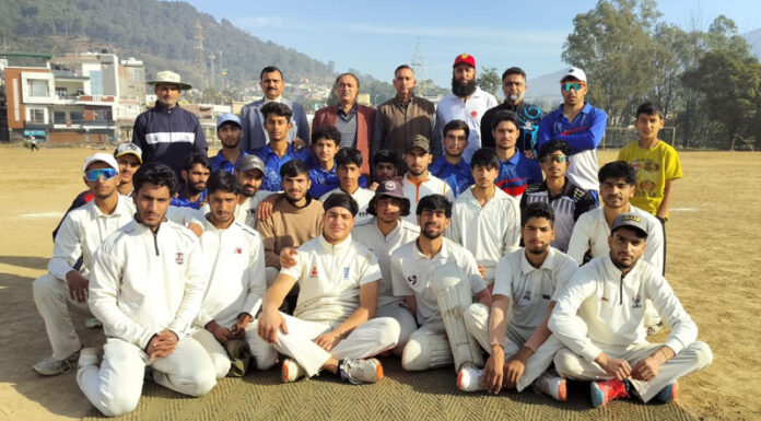 Dignitaries posing along with cricket team during a match at Udhampur.