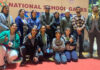 J&K Kurash team posing along with medals and support staff.