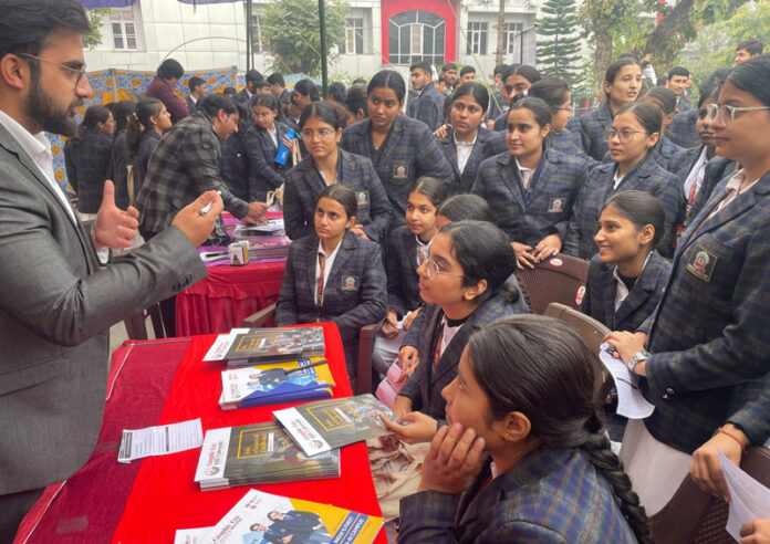 Representative of university guiding students during Career Fest.