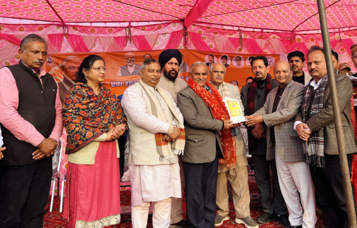 Senior BJP leaders along with poets during a Kavi Sammelan at Atal Ji Park, Gangyal, Jammu.