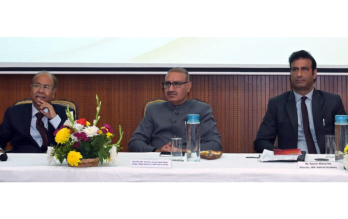 Justice Javed Iqbal Wani (centre) during orientation programme on Sunday.